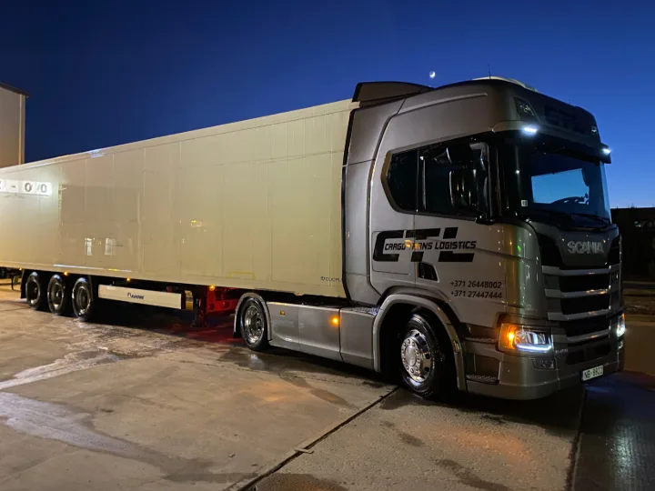 A CTL Scania and reefer trailer at the depot after dark